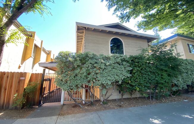 Updated Midtown 2 Bedroom Townhouse in Gated Community with Off-Street Parking
