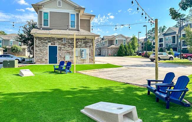 Outdoor entertaining area with cornhole