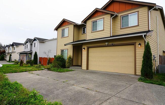 Spacious move in ready 5+bedroom 2.5-bathroom house in a desirable Tacoma area!