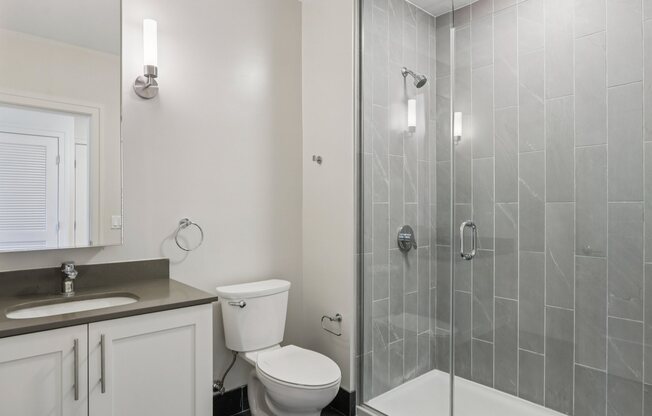 Bathroom with a shower and toilet at Park77 Apartments, Massachusetts