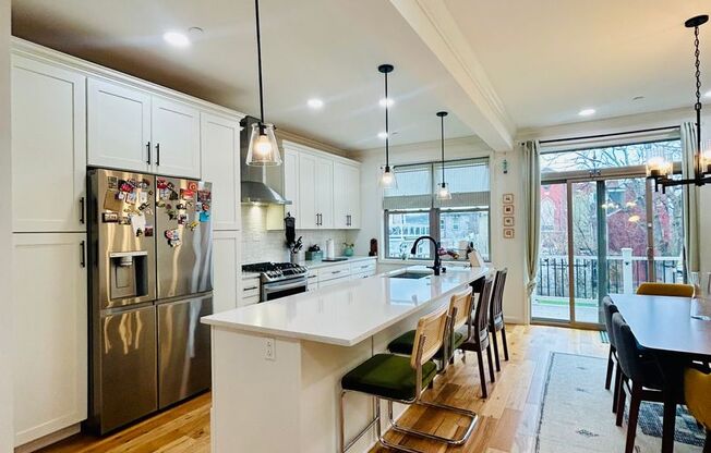 Luxury Townhome with Rooftop Deck & Skyline Views – 4BR/3.5BA