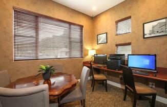 a living room filled with furniture and a flat screen tv