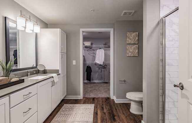 Master Bathroom with Vanity and Closet at Edge75, Naples, Florida 34104