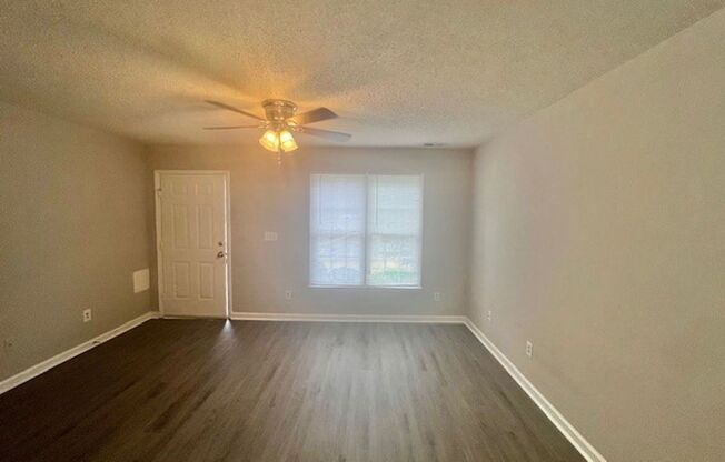 New Flooring!  New Paint!  Convenient to Schools & Shopping!  Lots of Closet Space!