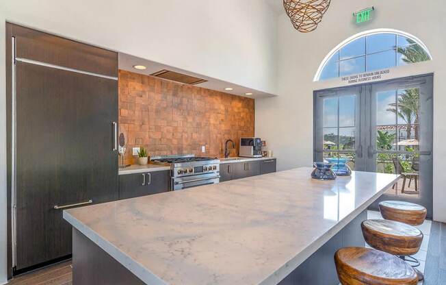 Clubhouse interior kitchen at Montecito Apartments at Carlsbad, Carlsbad, CA