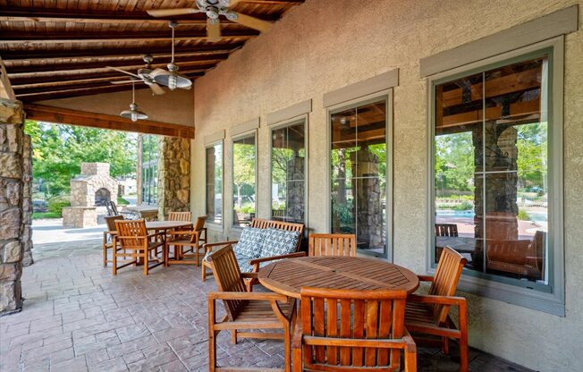 A patio with a table and chairs is shown.