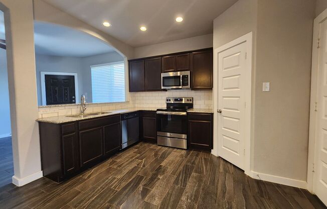 Duplex Minutes from Creekside Shopping & Entertainment! Fridge Included / Large Yard/ CISD
