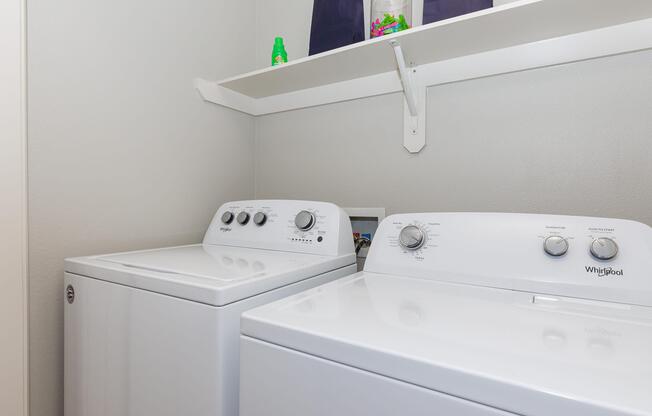 a kitchen with a sink and a mirror