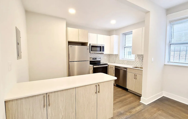 Great location! Fenway apartment with in-unit washer/dryer near B, C, D and E Lines, Orange Line and Commuter Rail stations!