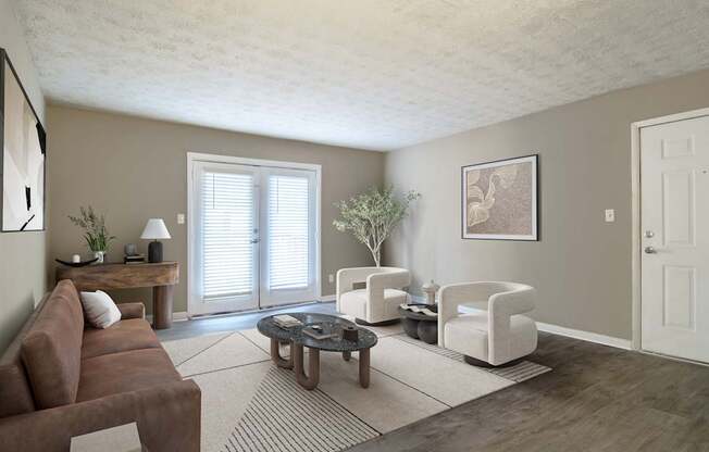 “Living room with large window door providing abundant natural light and access to outdoor space in a pet-friendly home at Stratford Ridge Apartments in Marietta, GA.