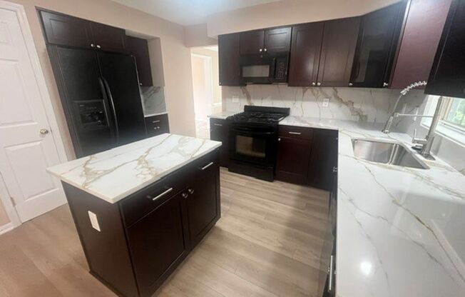 Spacious and Spectacular! 4 Bedroom home on gorgeous lot.
