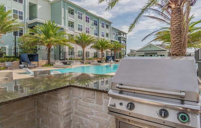 Outdoor Grill Area Overlooking The Pool & Sundeck