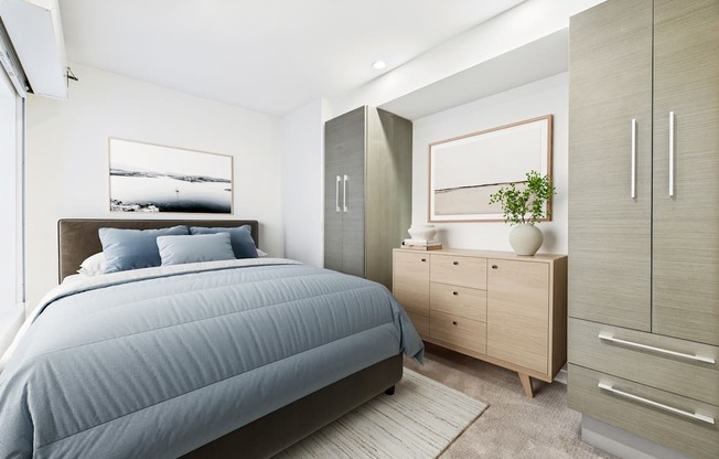 A bedroom with a bed, dresser, and mirror.
