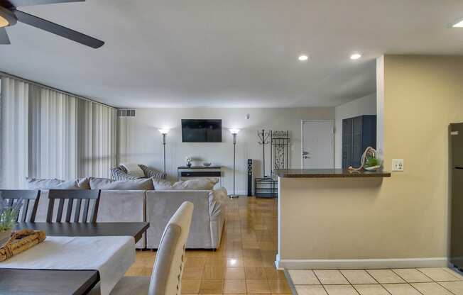 a view of the living room and dining room from the kitchen