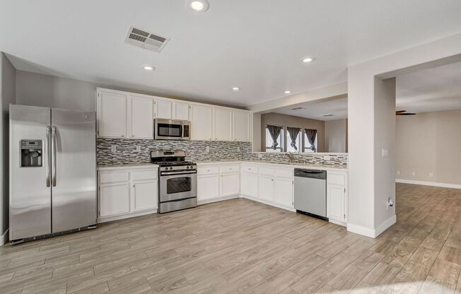 Totally Updated Solar Powered 4 Bedroom! Bedroom and Bath Downstairs!