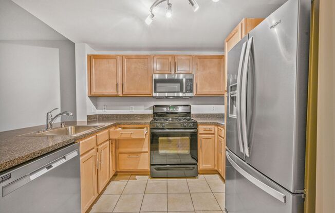 Beautifully Renovated 1BR Condo With Balcony in Amenity Rich Community with Parking!