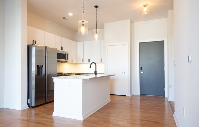 Our redesigned kitchens feature tiled backsplash and stainless steel appliances.