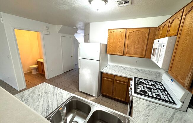 Townhome featuring stylish layout in gated community.