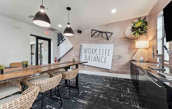 A modern office space with a sign that reads at The Laurel Apartments, Arizona, 85286