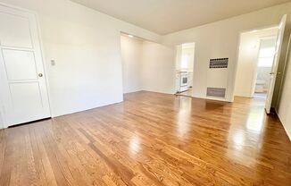 Charming 2-Bedroom Home with Hardwood Floors & Fireplace Near the Traffic Circle