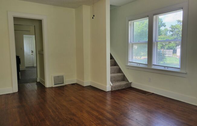 Floor-tastic Retreat: Rent this 3 Bed/1 Bath House with a Porch Full of Possibilities!