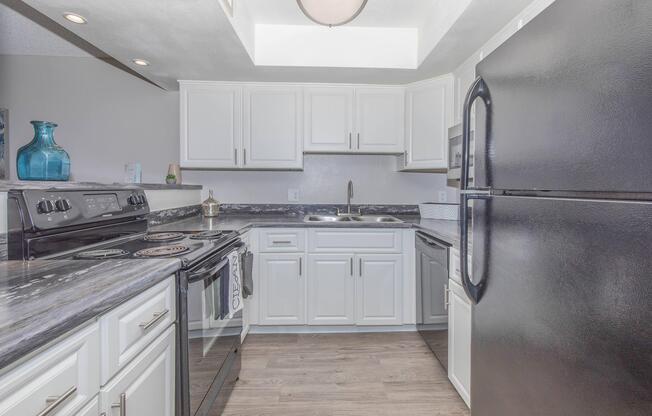 a stainless steel refrigerator in a kitchen