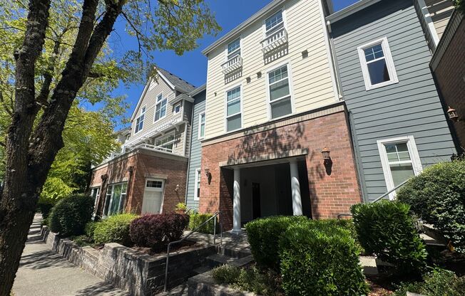 Spacious is Aqua Highlands one bedroom plus den townhome with garage