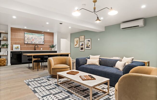 a living room with a couch and a table