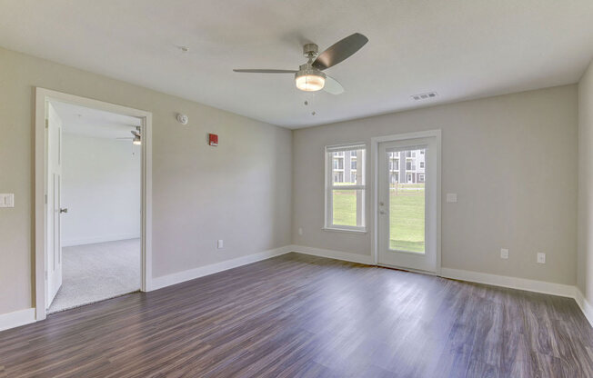 Stylish Living Room with Hard-Surface Flooring at Chase Creek Apartment Homes, Huntsville, AL, 35811