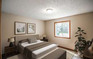 a bedroom with a bed and a window. Bismarck, ND Eastbrook Apartments.