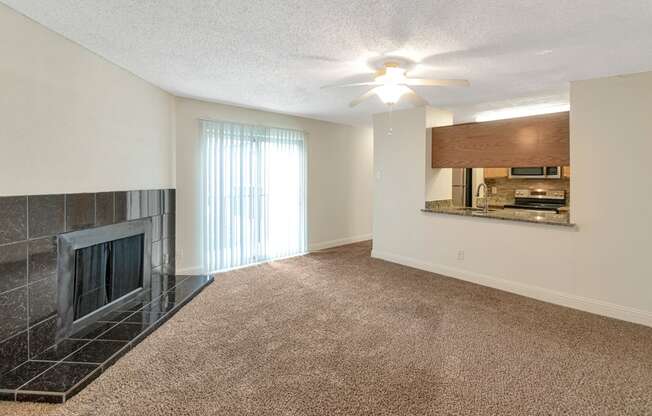 This is a photo of the living room in the 982 square foot 1 bedroom, 1 bath apartment at Cambridge Court Apartments in Dallas, TX.