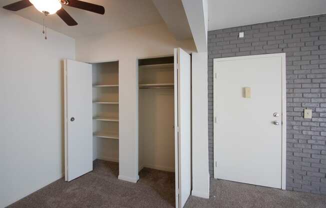 This is a photo the dining room pantry/closet and coat closet in the 833 square foot Chestnut, 2 bedroom apartment at Montana Valley Apartments in Cincinnati, OH.