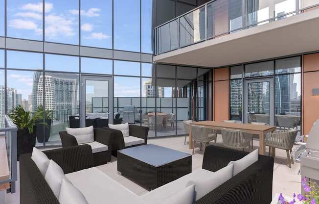 a living room with couches and a table in front of windows at Cassidy on Canal, Chicago, 60606