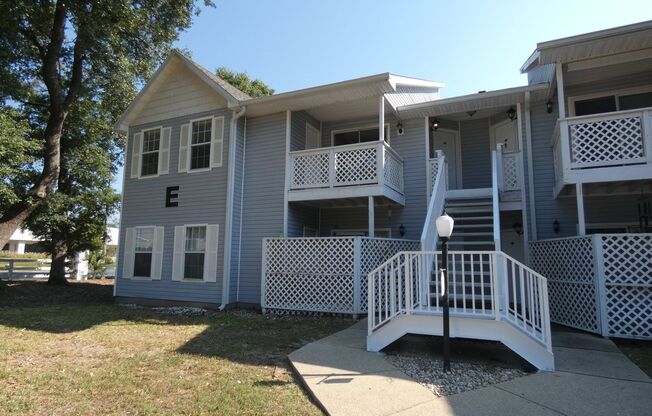 Updated Upstairs Unit with Vaulted Ceilings, Modern Kitchen, and Community Pool Access!