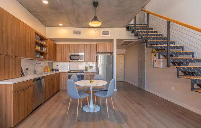 a kitchen with a wood floor