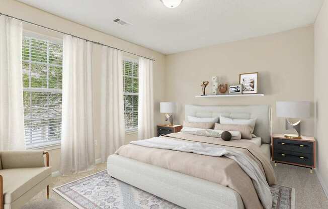 A bedroom with a large bed and a chair.