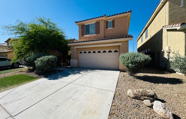 4 bedroom 3 bath home with separate family and living rooms! Tile and vinyl planks throughout as well as a large covered patio!