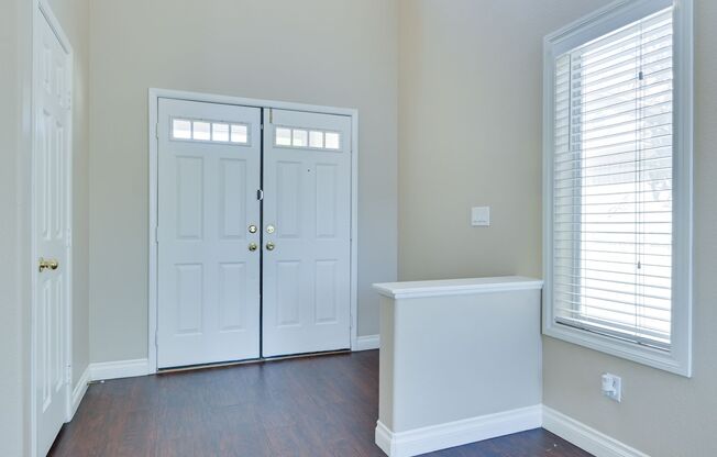 NW!!! 4 Bedrooms!!  Two Tone Paint Freshened!! Wood flooring Down stairs!! New Carpet in upstairs bedrooms!!!