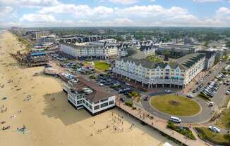 an aerial view of the beach and the city of cape cod at Pier Village Apartments, Long Branch, New Jersey