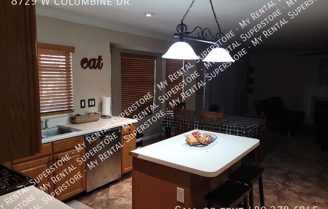 8729 W COLUMBINE DR