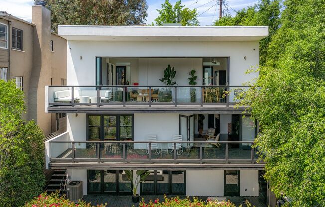 Architectural Contemporary with Panoramic Views & Resort-Caliber Outdoor Living in Franklin Hills
