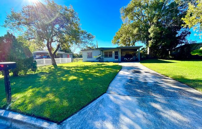 Lawn Service included with this 2BR/1BA w/Carport, Office, and Bonus Room