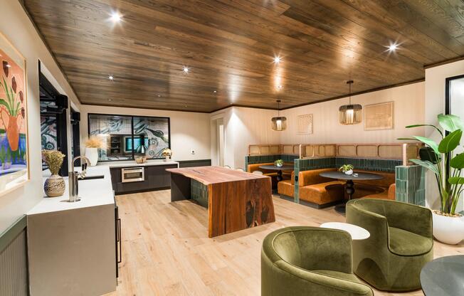 Enjoy the sky lounge with chef-style kitchen and cozy booth seating at Modera St. Paul.