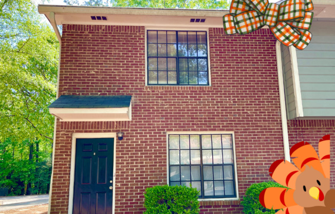 Welcome to this ADORABLE Space, a charming 2 bedroom, 2 bathroom townhome located in Fayetteville, GA