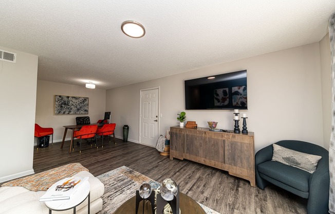 Spacious living room with hardwood-style flooring