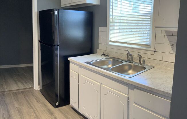COMING SOON: Attractive Townhouse! 4 BR, 2 Baths; Privacy Fenced Backyard, Small Pets Ok!