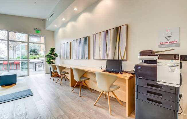 Community area with seating, computer, and printer