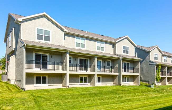 view of back exterior of townhomes at Prairie Pines Townhomes, Shawnee, 66226