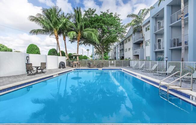 a large pool of water in front of a building