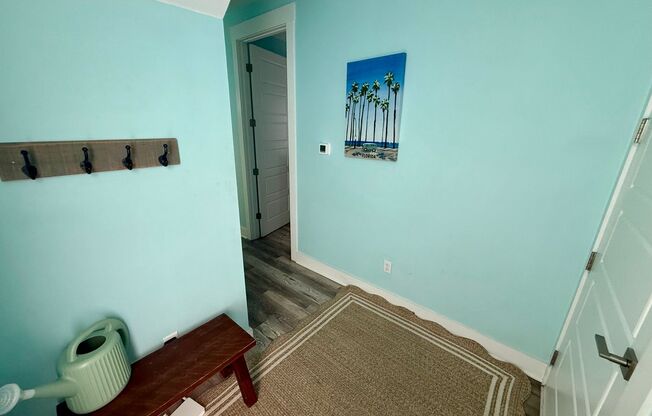 4 Bed 3 Bath Fully Furnished Modern Home with 2 Car Garage just 2 Blocks from the Beach! Pet Friendly with Fenced in Backyard, Second Floor Balcony & Fully Equipped Kitchen!